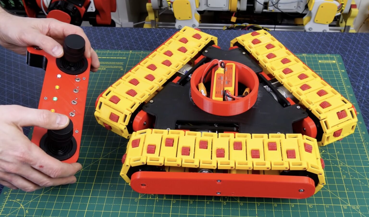 Can a triangle of tank tracks outperform omni wheels? | Arduino Blog