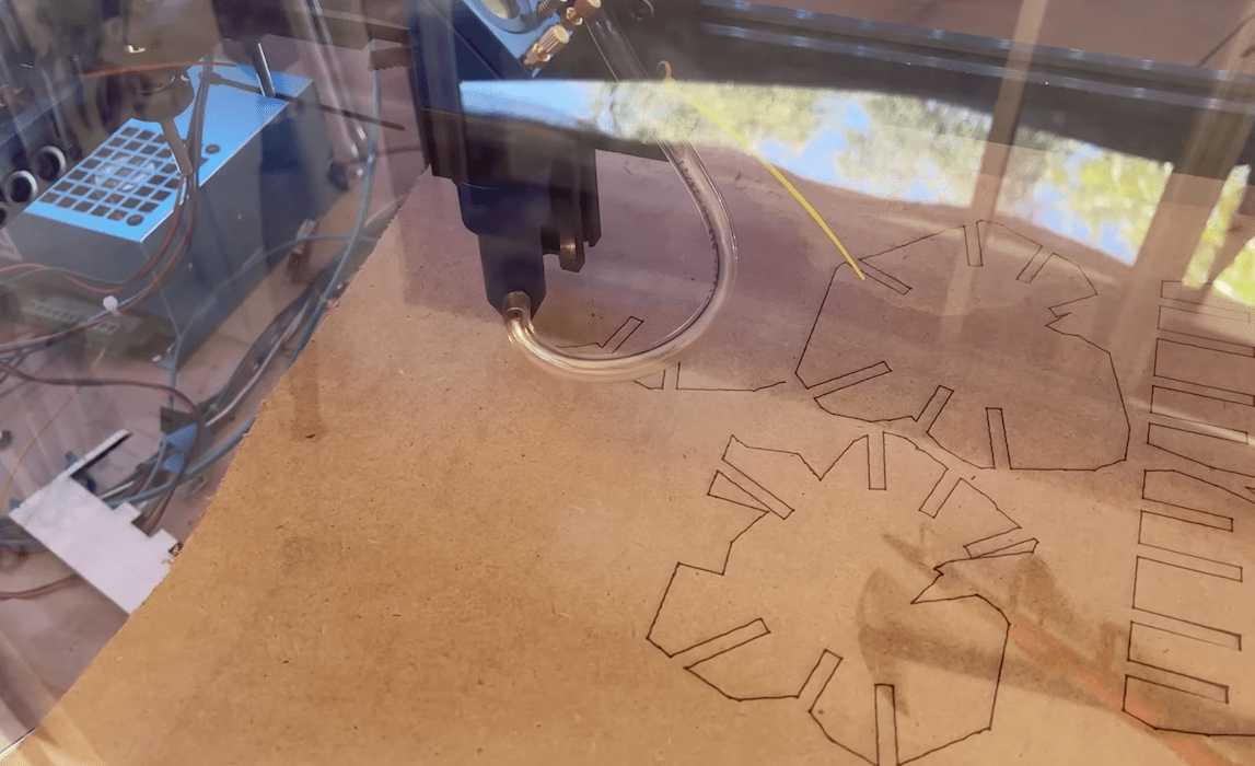 This large format laser cutter was built from the ground up for just $700