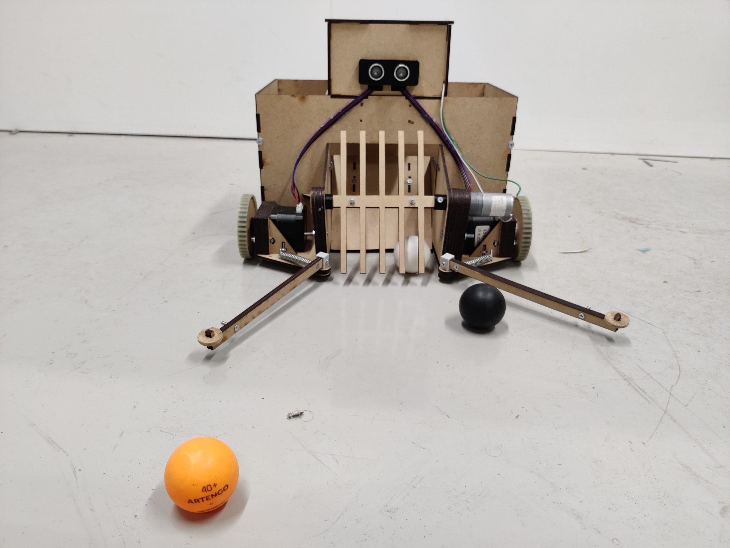 Robot collects ping pong balls after matches