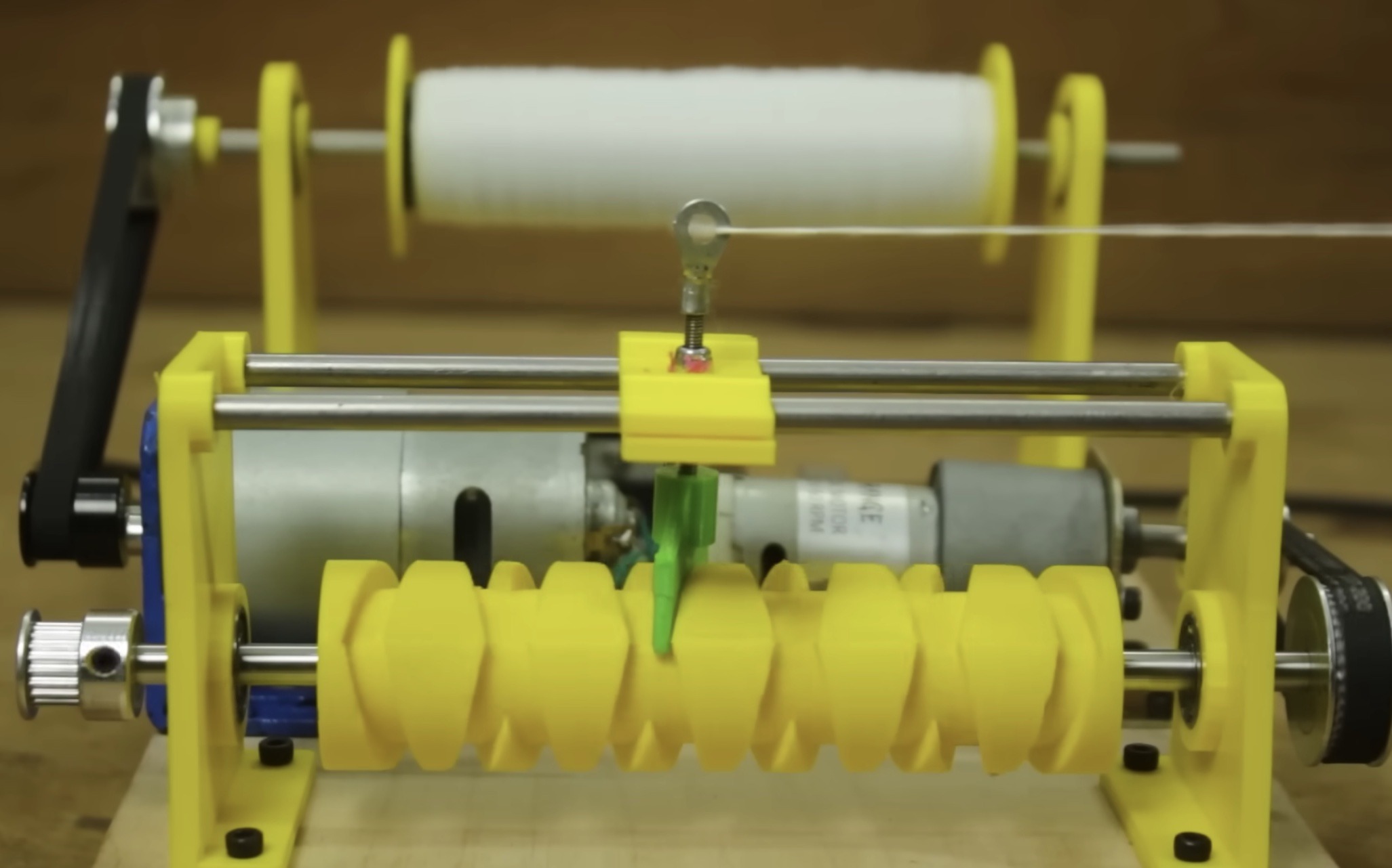 The automated winder has an automatic reversing screw