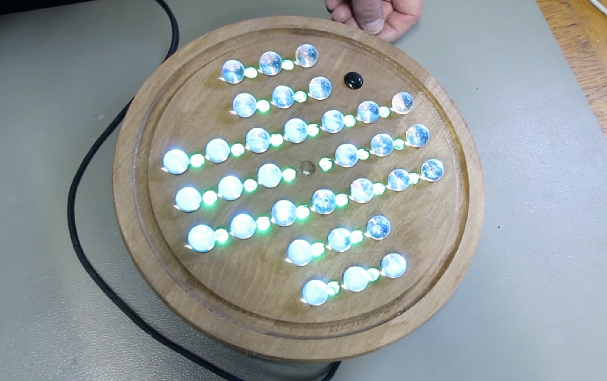 DIY marble solitaire board helps you solve the puzzle