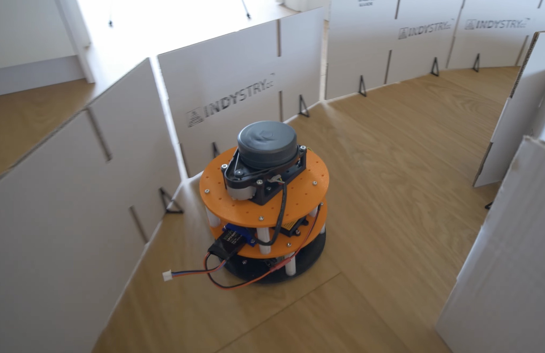 Teaching an Arduino UNO R4-powered robot to navigate obstacles autonomously