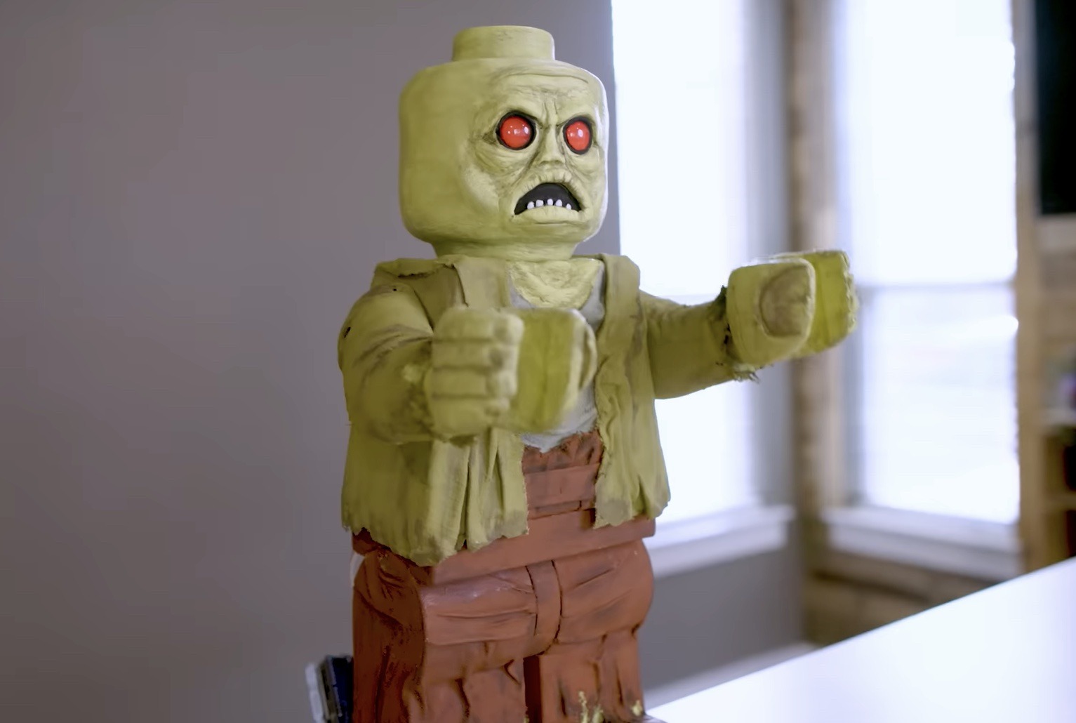 This giant animatronic LEGO minifig zombie is a delight 